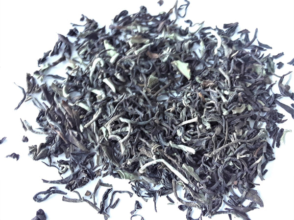 silvery loose leaf tea leaves