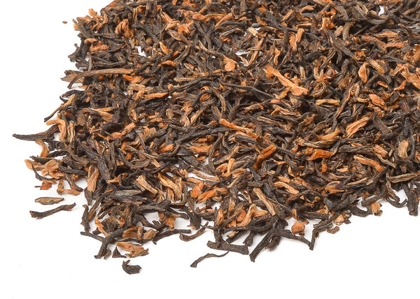 golden coloured loose leaf tea leaves