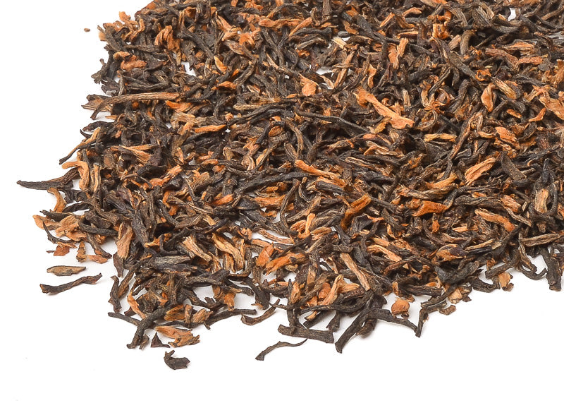 golden coloured loose leaf tea leaves