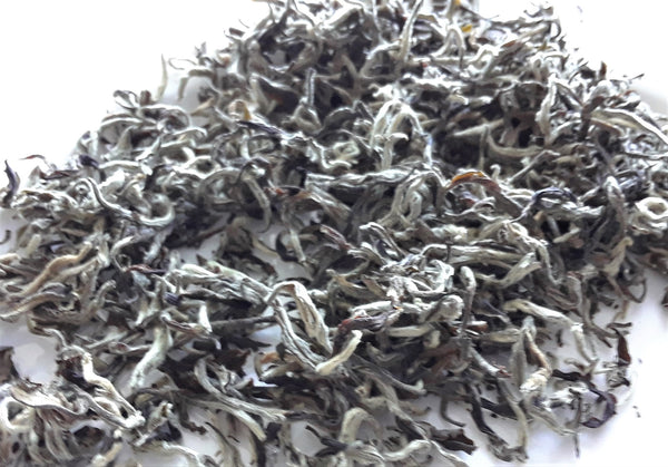 silvery loose leaf tea leaves